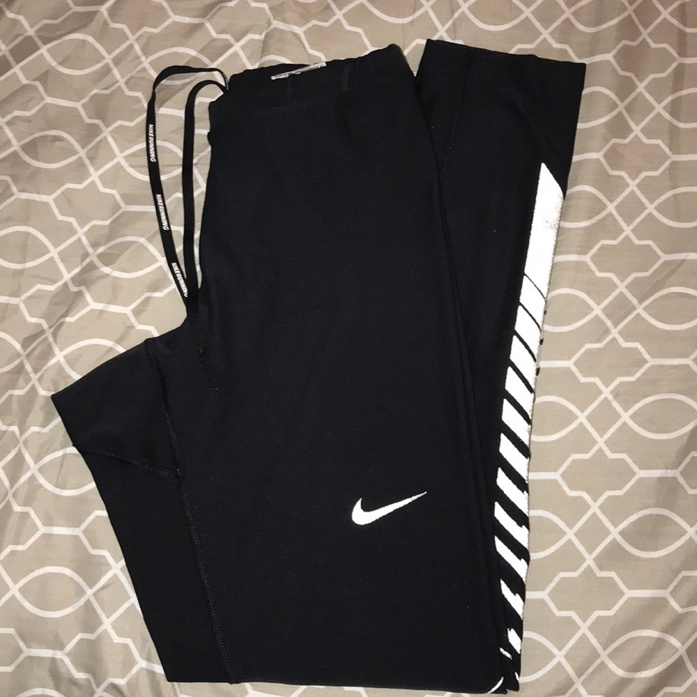 NIKE Dri-Fit woman’s reflective leggings Size M